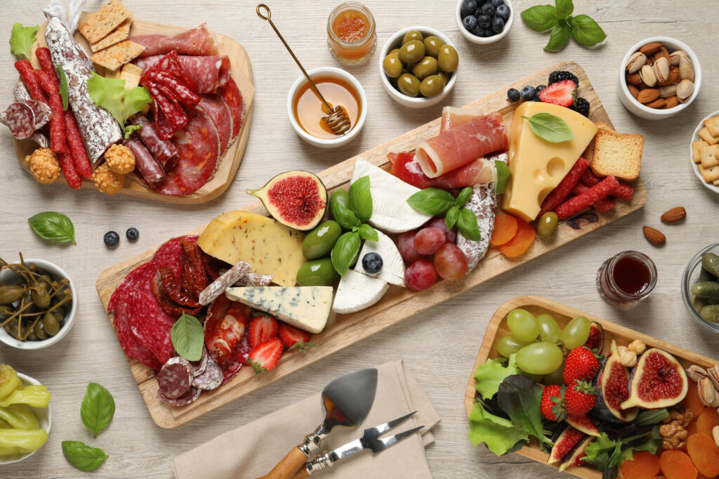 charcuterie meats and cheeses on a board