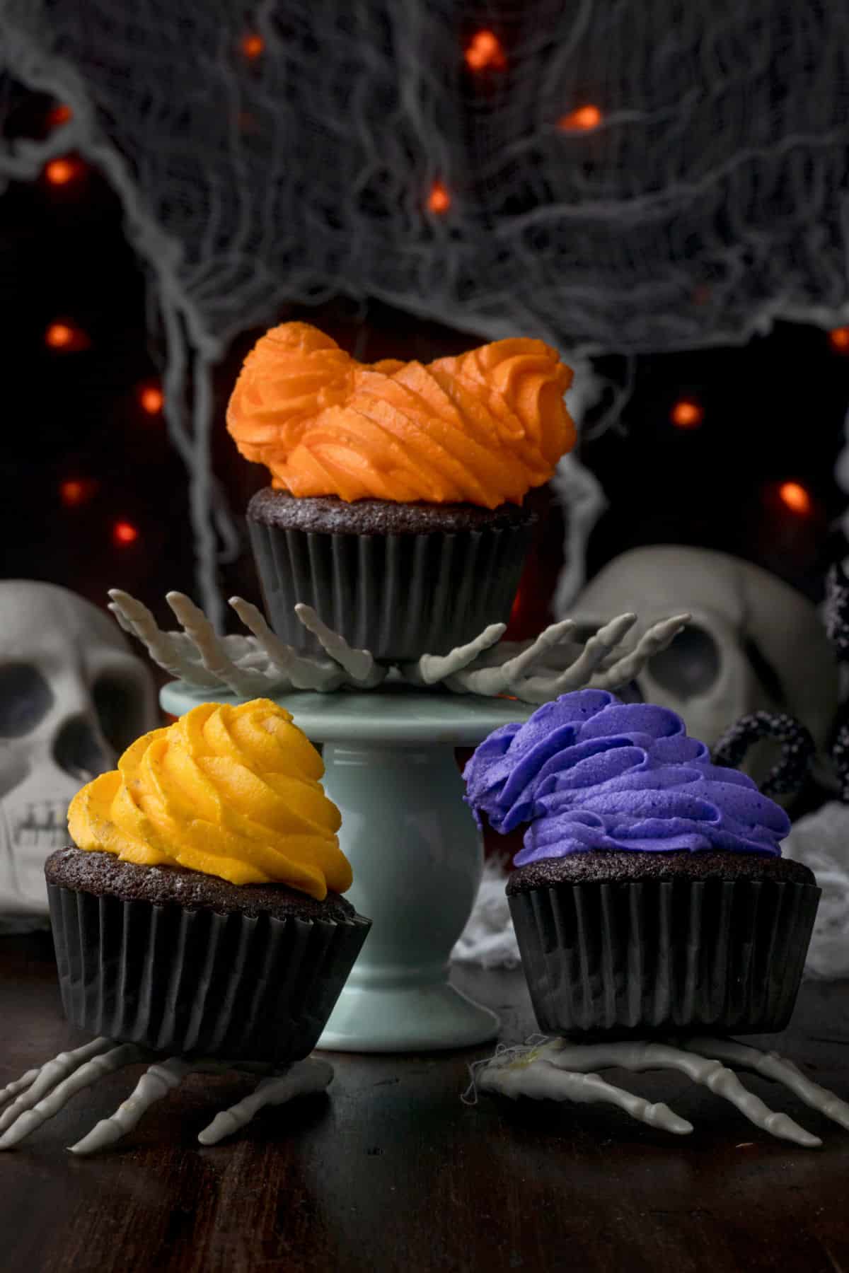 cupcakes in front of a spooky backdrop