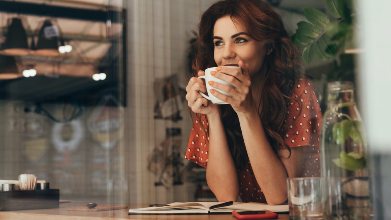 Beautiful woman enjoying coffee